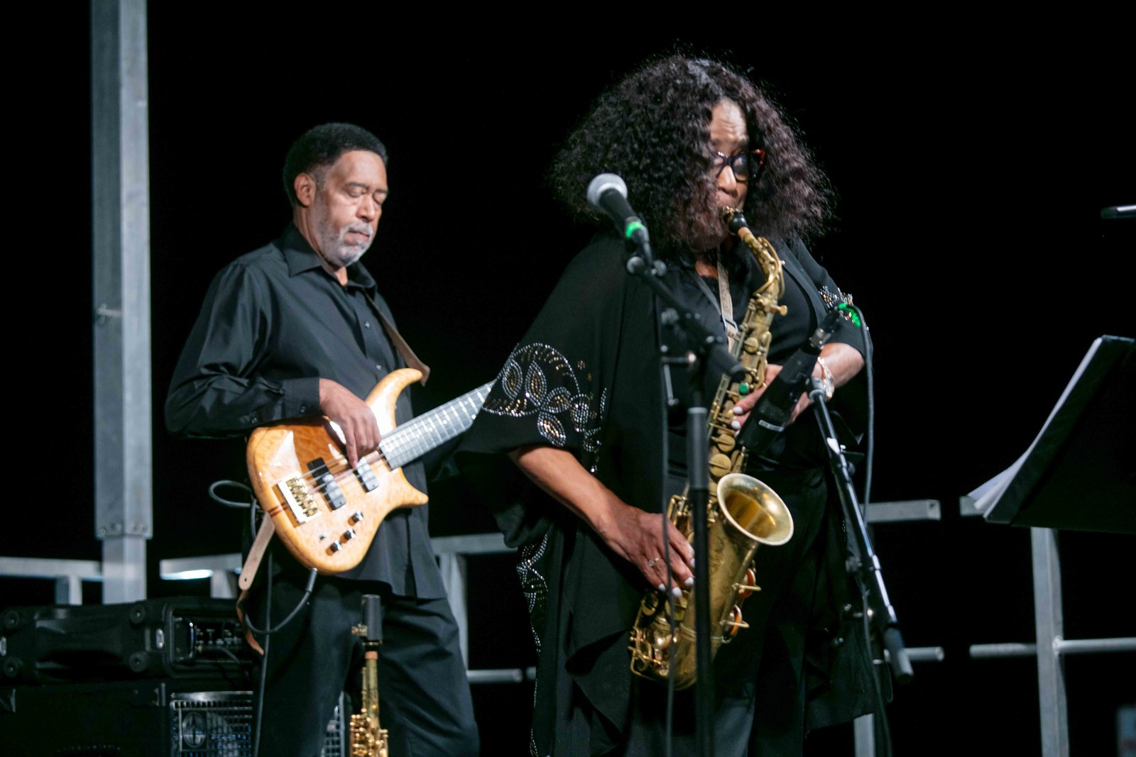 Guitarist and saxophonist playing together