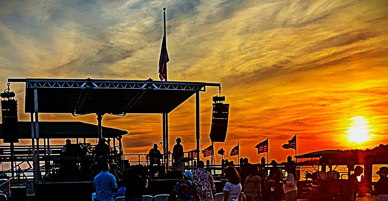 The Jazz on the Waterfront stage and audience at sunset